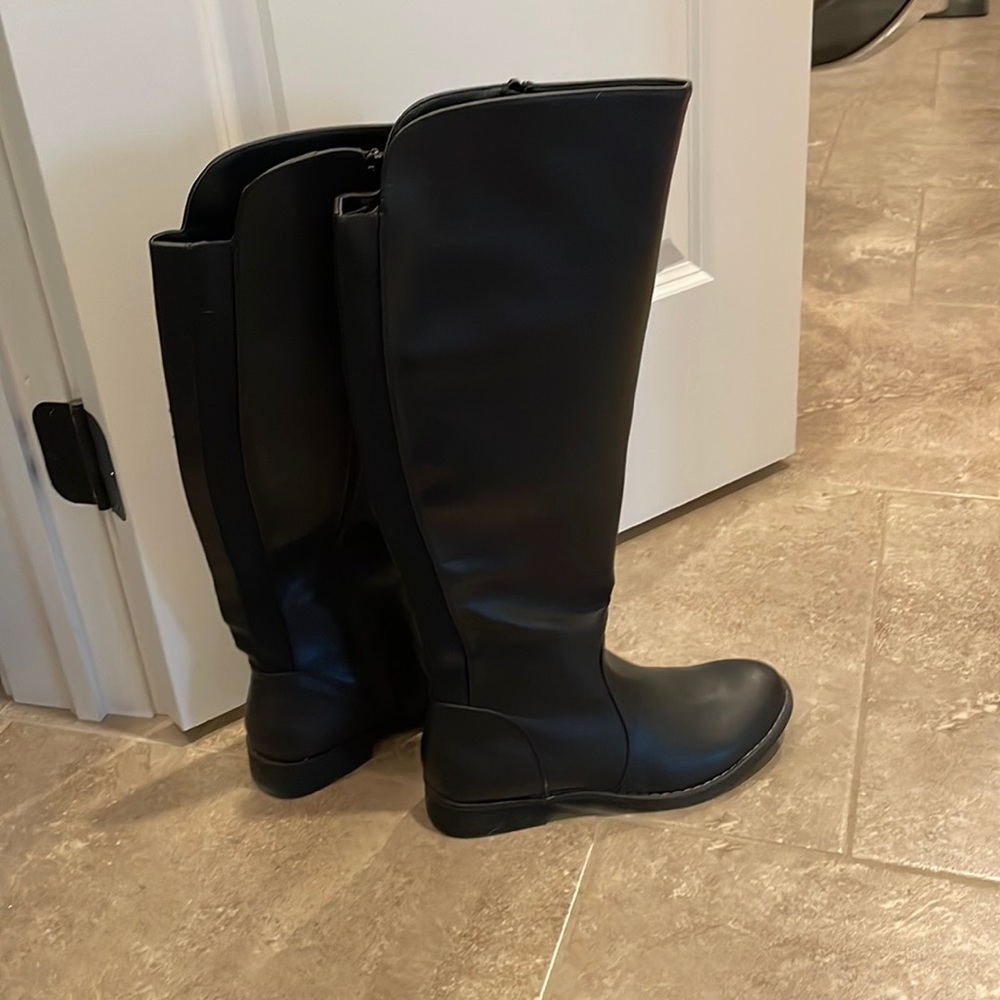 Black tall leather boots